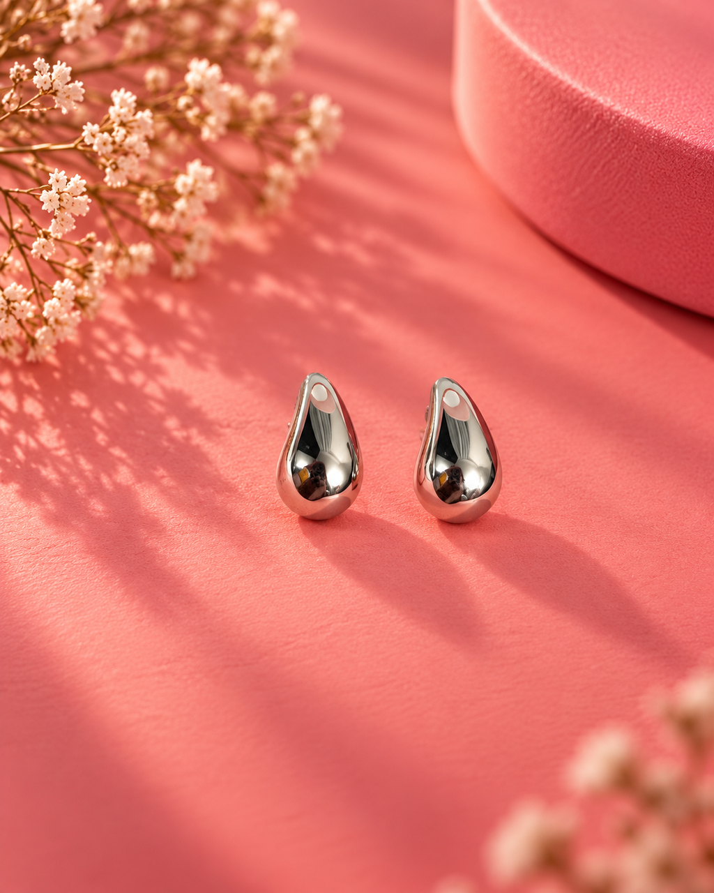 Sleek Silver Teardrop Stud Earrings